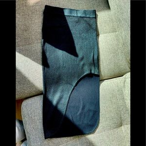 Pencil skirt with asymmetrical slide